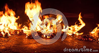 Burning fire stone on a floor background Stock Photo