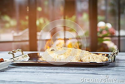 Burning fish on tray. Stock Photo