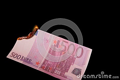 Burning five hundred Euros Stock Photo