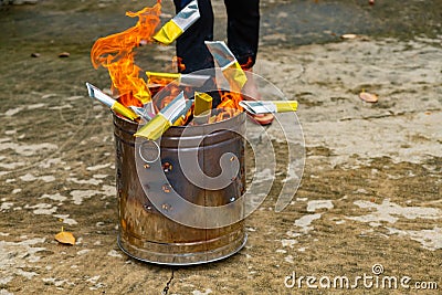 A Chinese tradition for praying ancestors, burning Joss paper. Stock Photo