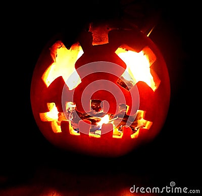 The burning halloween pumpkin Stock Photo