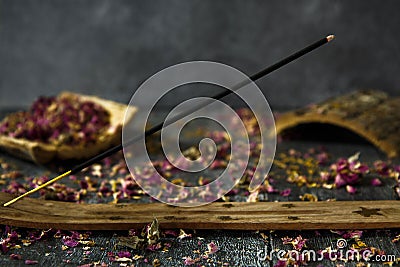 Burning incense on a wooden stand. Editorial Stock Photo