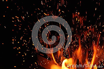 Burning log and fire spark Stock Photo