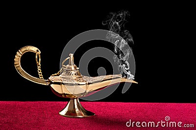 Burning magic lamp Stock Photo