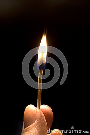 Burning match Stock Photo