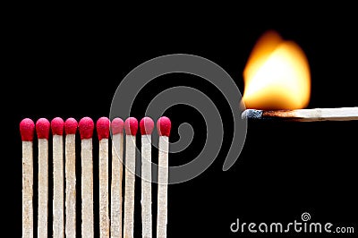 A burning match near other matches Stock Photo