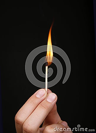 Burning match stick Stock Photo