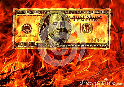 Burning money in flame of fire. Conceptual. Stock Photo