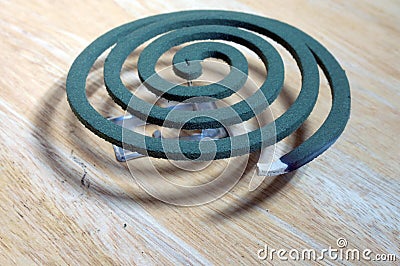 Burning mosquito coil is an anti-mosquito repellent Stock Photo