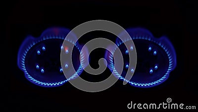 Burning natural gas on two burners Stock Photo