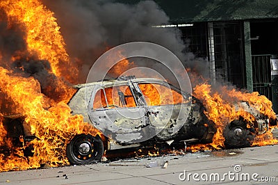 Burning police car. Editorial Stock Photo