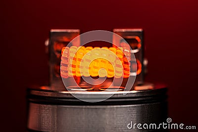 Burning staple staggered fused clapton coil Stock Photo