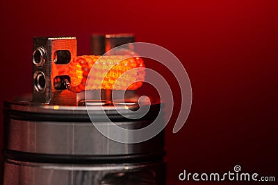 Burning staple staggered fused clapton coil Stock Photo