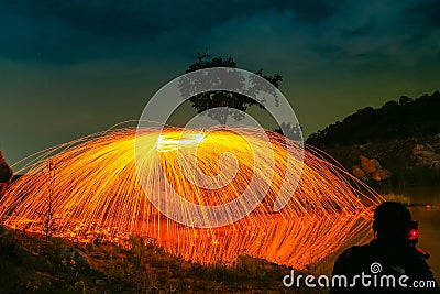 burning steel wool spinning circle Editorial Stock Photo