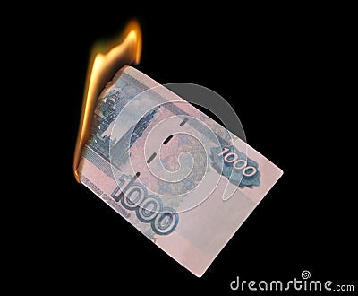 Burning thousand rubles Stock Photo