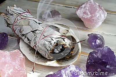 Burning White Sage Smudge Stick Stock Photo