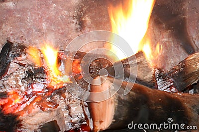 Burning wood fireplace Stock Photo
