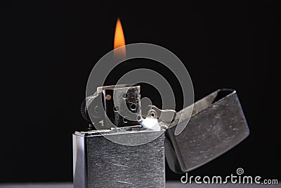 Burning zippo lighter Stock Photo