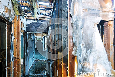 Burnt black house after fire damaged interior details arson from a home Stock Photo