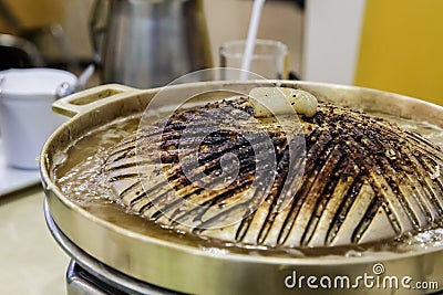 Burnt brass pan Stock Photo