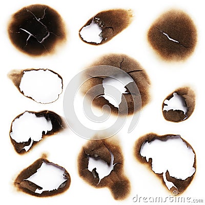 Burnt holes of paper Stock Photo