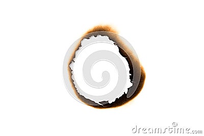 burnt holes in a piece of paper isolated on white background Stock Photo