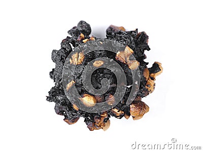 Burnt popcorn kernel Stock Photo