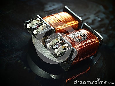 Burnt power transformer with copper winding Stock Photo