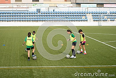 Burriana, Spain 9/17/2019: Soccer girls training Editorial Stock Photo