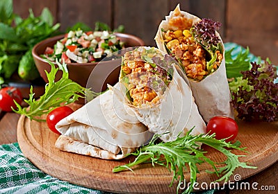 Burritos wraps with minced beef and vegetables Stock Photo