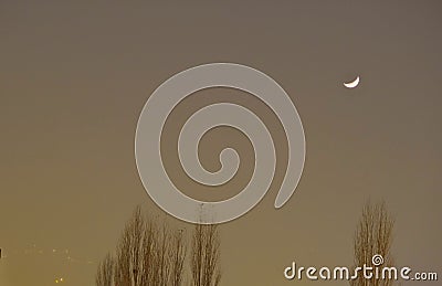 Bursa sky during foggy night. Crescent moon Stock Photo