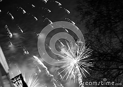 Burst colorful fireworks in night dark sky Stock Photo