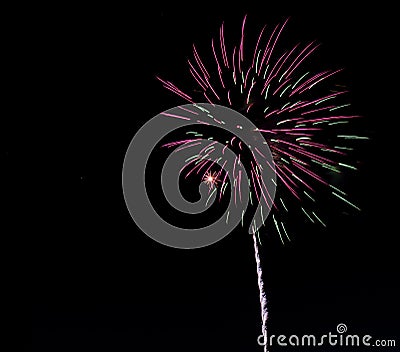 Bursting fireworks against black background Stock Photo