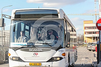 The bus driver with passengers while driving. Editorial Stock Photo