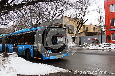 Bus following the city route Editorial Stock Photo