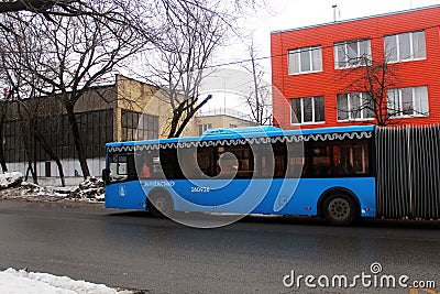 Bus following the city route Editorial Stock Photo