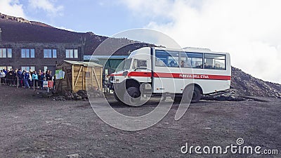 Bus getting tourists on the summit of Etna volcano Editorial Stock Photo