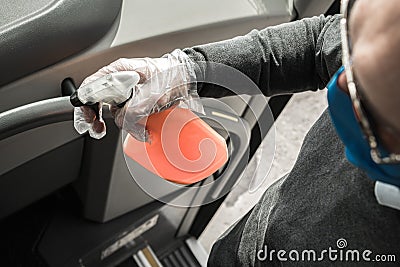 Bus Interior Disinfection by Caucasian Driver Stock Photo