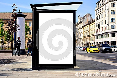 bus shelter at bus stop. blank lightbox billboard ad sign. white poster space. streetscape and traffic Stock Photo