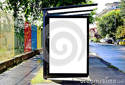 bus shelter at bus stop. blank lightbox billboard ad sign. white poster space. Stock Photo