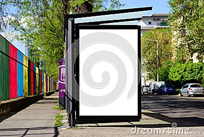 bus shelter at bus stop. blank lightbox billboard ad sign. white poster space. Stock Photo