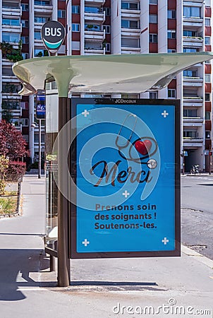 Bus stop billboard during Coronavirus Lockdown in Paris street Editorial Stock Photo