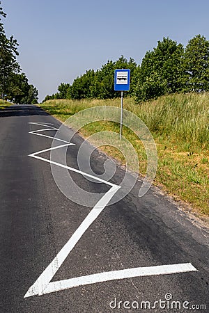 Bus stop in the countryside. Place of stopping the bus in a field in the countryside Stock Photo