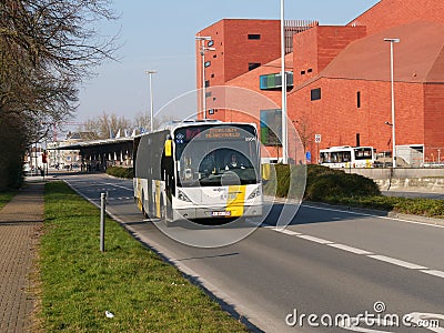 A bus (Van Hool) from De Lijn (company), drive from the 't Zand to the station of Bruges. Editorial Stock Photo