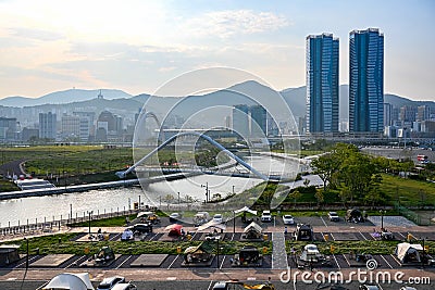 Busan, Korea, camping in front of the cruise terminal with a view of the suburbs. Editorial Stock Photo