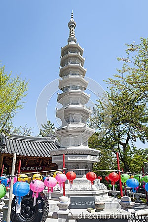 Stone pagoda at entrance to Haedong Yonggungsa Temple, a Buddhist temple and attractions in Busan, South Korea Editorial Stock Photo