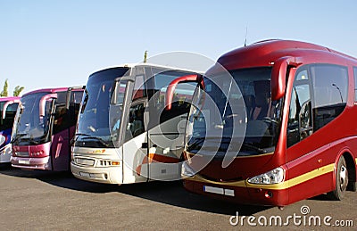 Buses or coaches parked in a car park Stock Photo