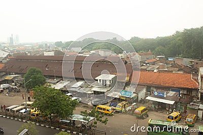 Buses and minibuses park at the Old Joyoboyo Terminal Editorial Stock Photo