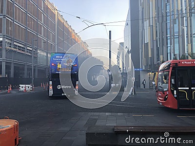 Buses stopped by smoke from a skip fire on Halsey Street, Auckland Editorial Stock Photo