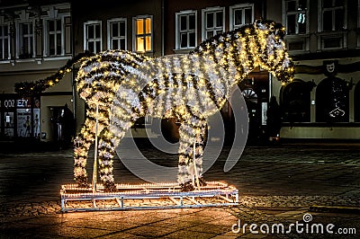 Bush shaped like a zebra decorated with Christmas lights Stock Photo